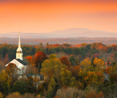 Overlooking a peaceful New England Farm in the autumn at sunrise with frost on foreground, Boston, Massachusetts, USA