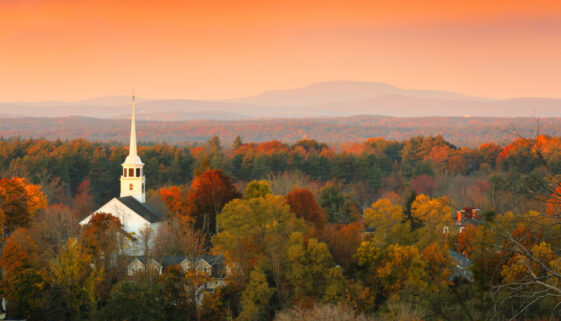 Overlooking a peaceful New England Farm in the autumn at sunrise with frost on foreground, Boston, Massachusetts, USA